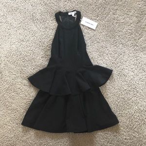 Flirty black halter peplum dress